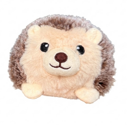 image of small hedgehog plush with brown fur and cream colored face, feet, and ears, and brown and black embroidered face.