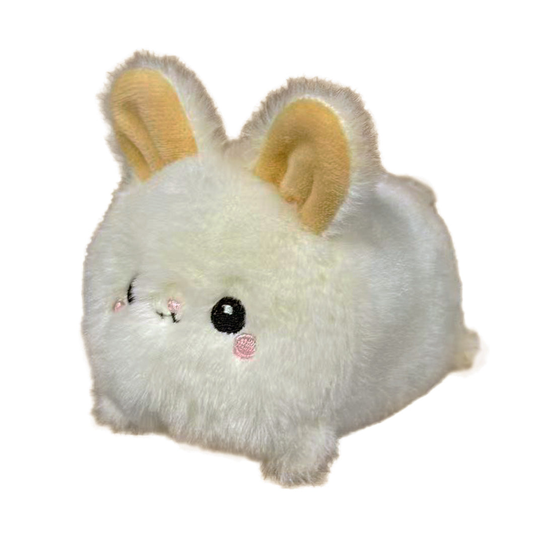 Small baby bunny plush on a white background