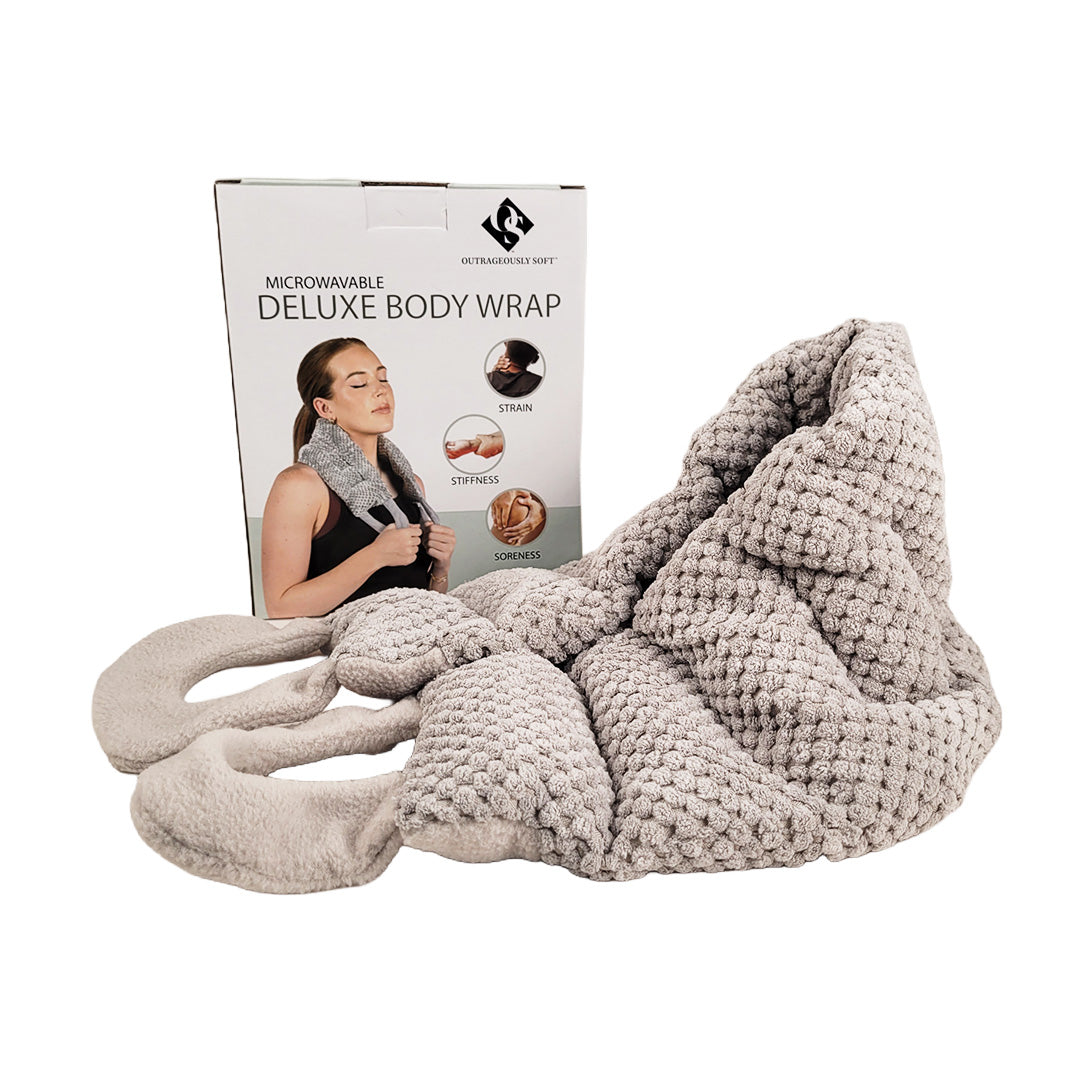 Beige microwavable deluxe body wrap with box next to wrap on a white background