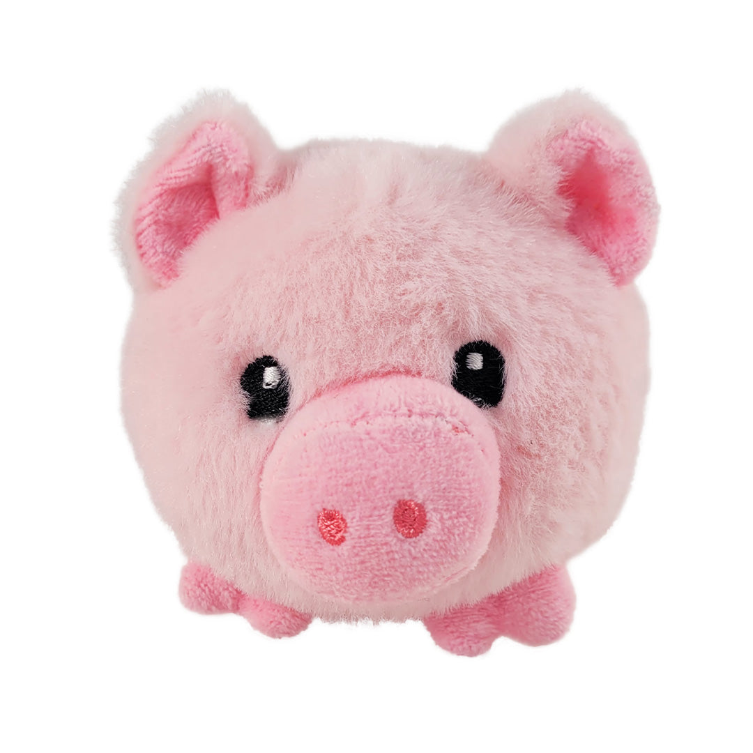 Front of pink plush pig toy on a white background