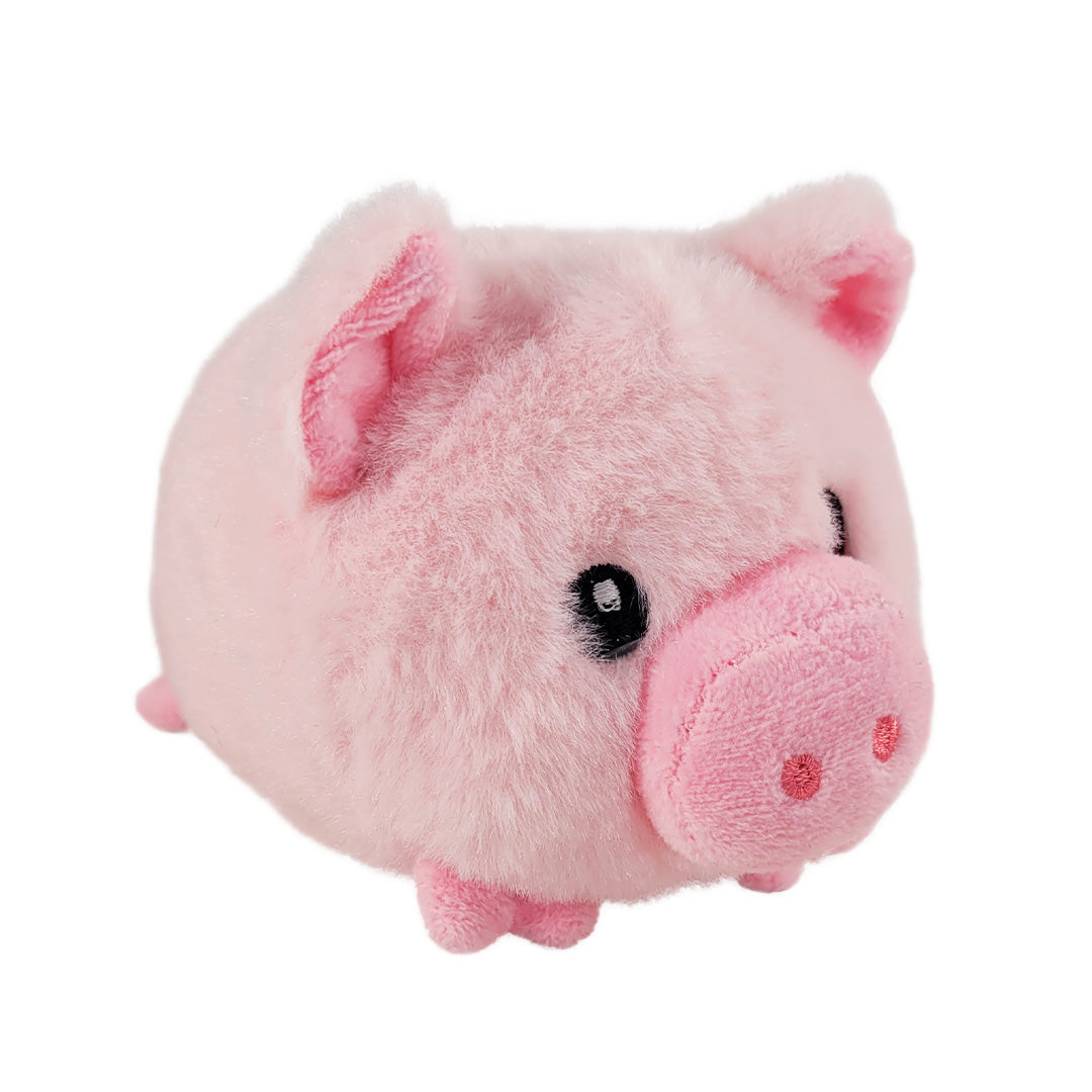Pink pig plush toy on a white background