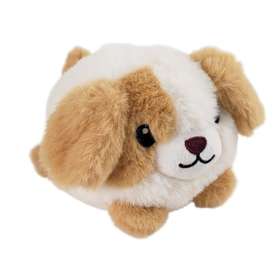 Small white puppy plush with tan spots on a white background