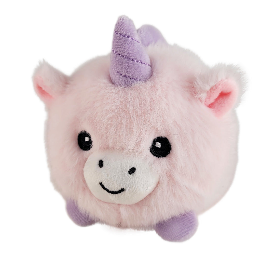 Small pink baby unicorn plush with purple horn on a white background.